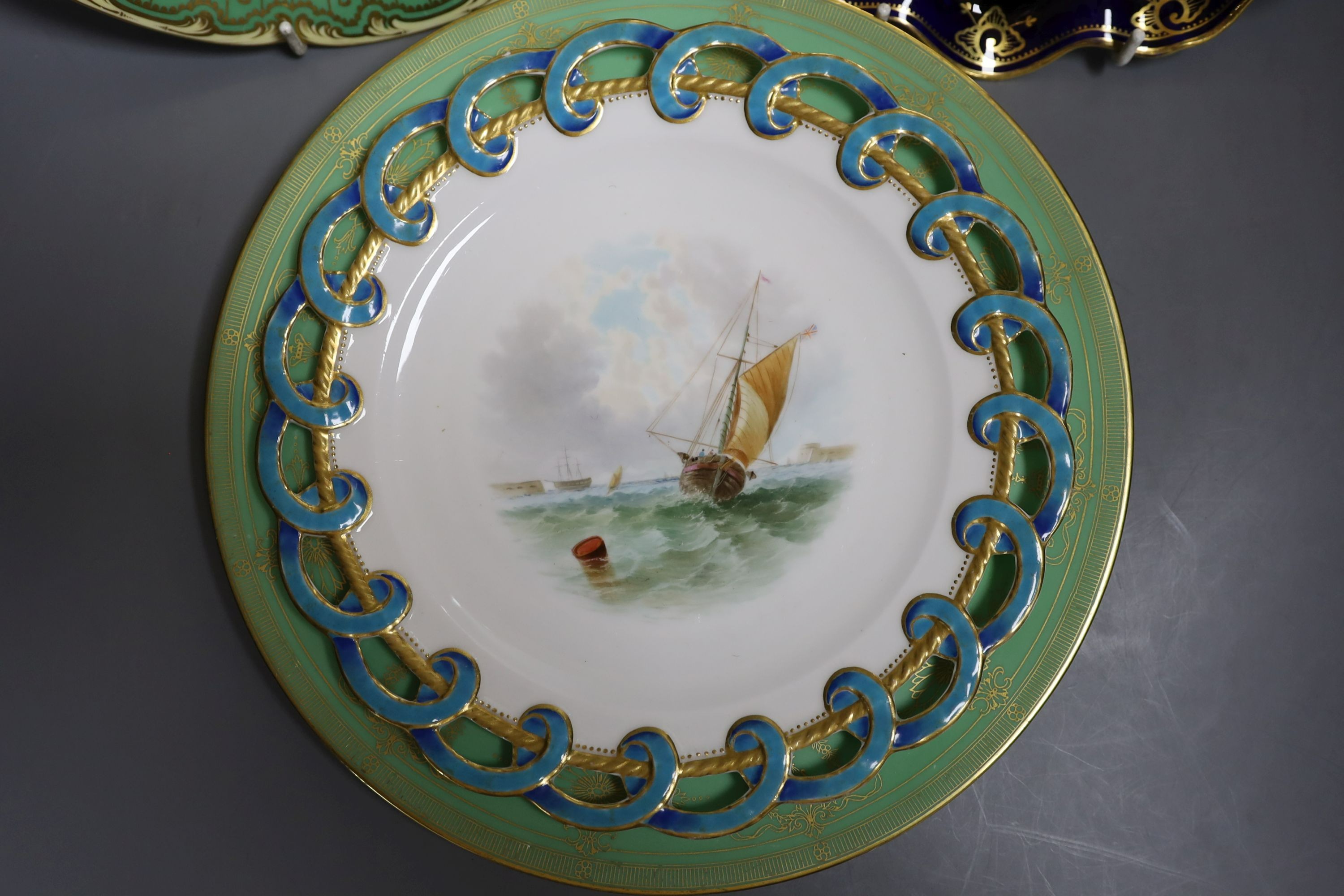 Four English porcelain topographical painted plates, to include Coalport, Royal Worcester and a similar (5)